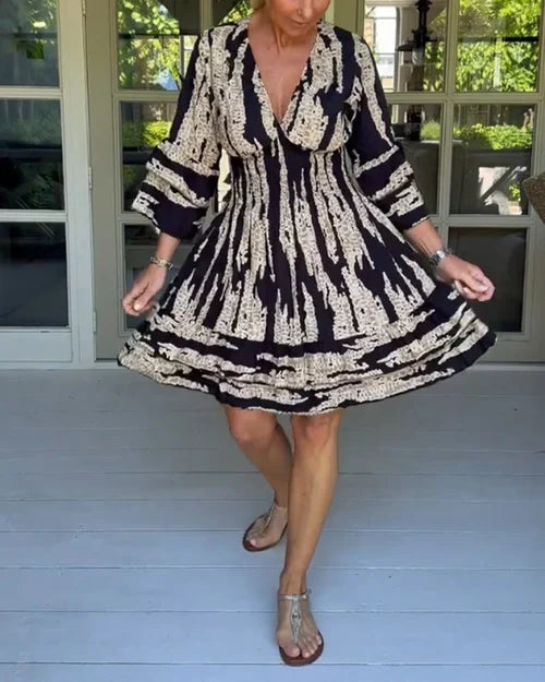 Luchtige & stijlvolle damesjurk met V-hals en 3/4 mouwen - Elina