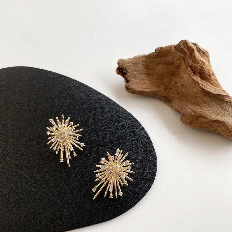 Gouden Vuurwerk Zirkonia Oorbellen - Livia