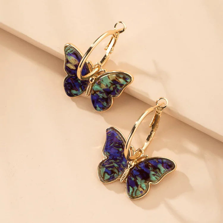 Vergulde Vlinder Oorbellen met Acryl Kristallen - Mariposa