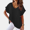 Luchtige V-hals linnenblouse met losse pasvorm – Mailin