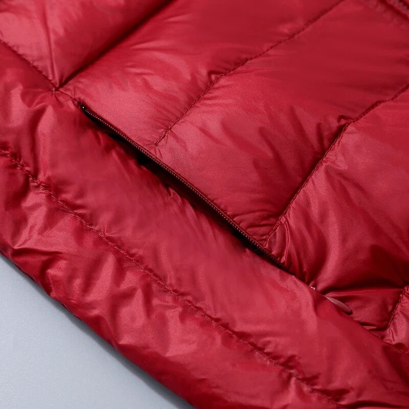 Omkeerbare donsjas met capuchon – Soraya