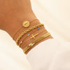 Gouden en zilveren kruis armband