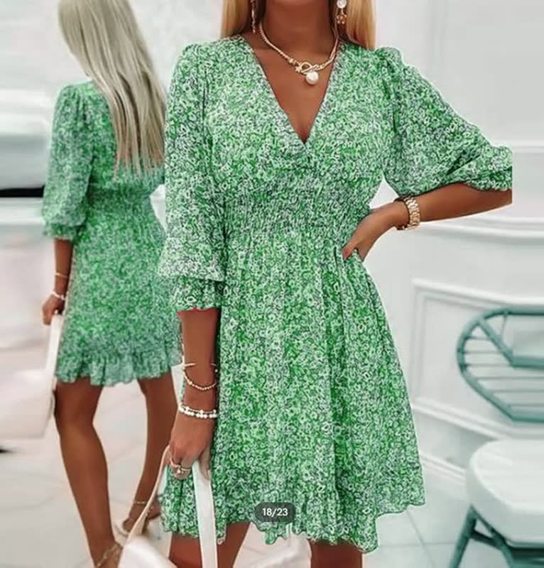 ELEGANTE MINI GEBLOEMDE JURK